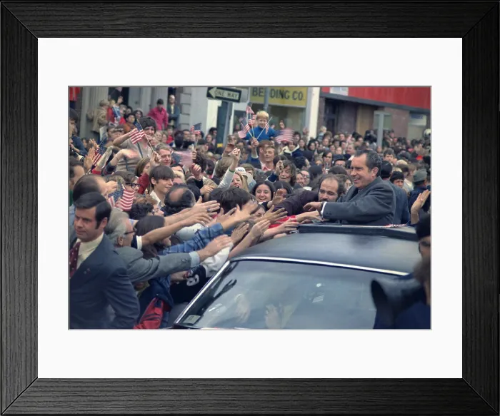 Framed Print : Nixon 1972 Re-election Campaign. Richard Nixon shakes hands with people swarming his motorcade during a campaign event in New Rochelle N.Y. Oct. 24 1972