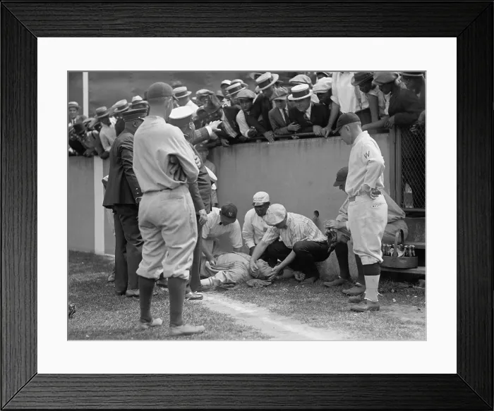 Framed Print : Babe Ruth knocked unconscious, at Griffith Stadium, Washington, D.C. Ruth ran into a concrete wall while trying to catch a foul ball on July 5, 1924. (BSLOC_2015_17_28)