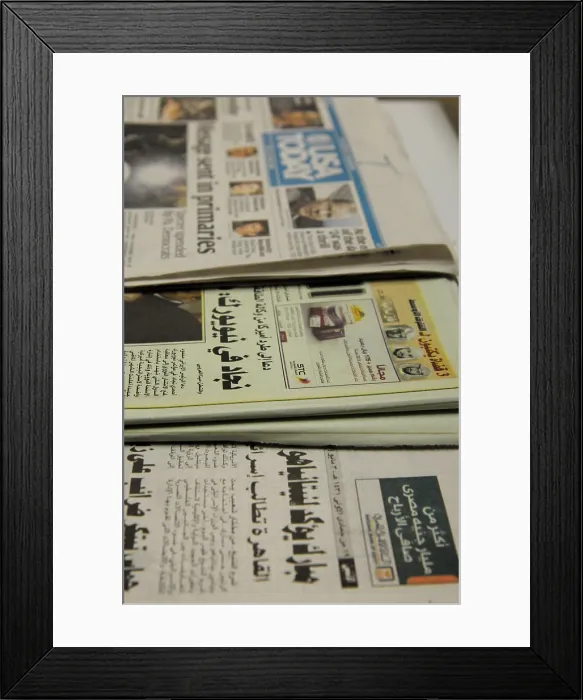 Framed Print : Newspapers in a variety of languages including Arabic are laid out for detainees at Camp Delta the military prison in Naval Base Guantanamo Bay Cuba Framed Print : Newspapers in a variety of languages including Arabic are laid out for detainees at Camp Delta the military prison in Naval Base Guantanamo Bay Cuba
