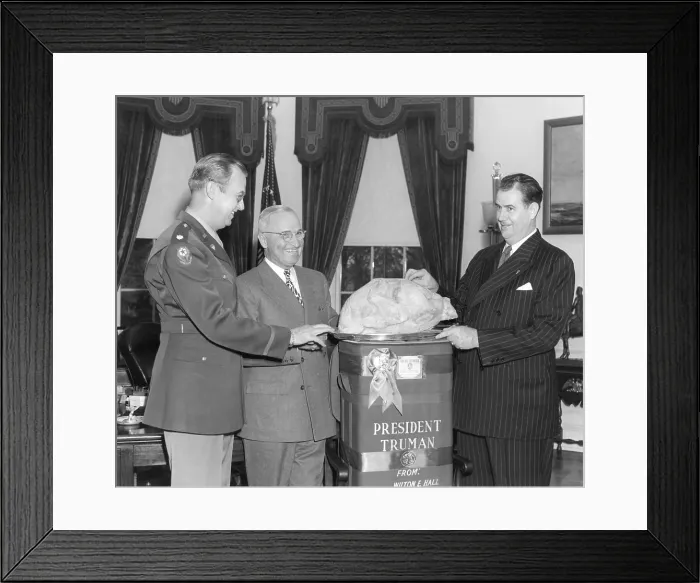 Framed Print : President Harry Truman accepts a turkey from Senator Olin Johnston of South Carolina. L-R: Colonel Lewis Jackson, President Truman, Senator Johnston. Nov. 25, 1946
