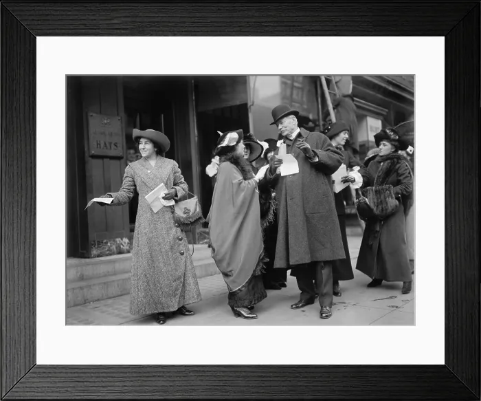 Framed Print : Smiling women suffragists hand out literature to advertise the 1913 parade in New York City