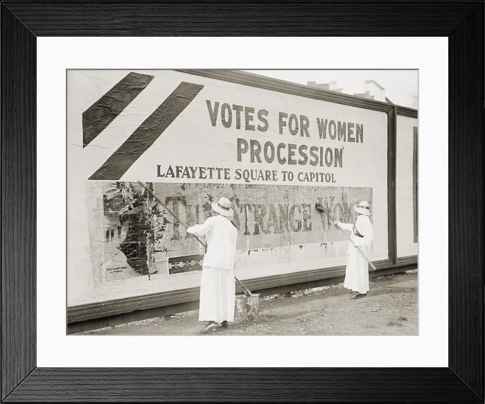 Framed Print : Women suffragists cover a billboard to advertise their Washington, D.C. parade Framed Print : Women suffragists cover a billboard to advertise their Washington, D.C. parade