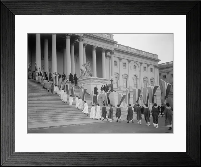 Framed Print : Woman Suffrage demonstration with banners at the U.S. Capitol in 1917. View of Procession ascending Capitol steps