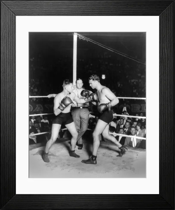 Framed Print : Jack Dempsey boxing with his trainer and sparring partner, Gus Wilson, in San Antonio, Texas. Sept. 25, 1925. Referee is Ray Newman. (BSLOC_2015_17_69) Framed Print : Jack Dempsey boxing with his trainer and sparring partner, Gus Wilson, in San Antonio, Texas. Sept. 25, 1925. Referee is Ray Newman. (BSLOC_2015_17_69)