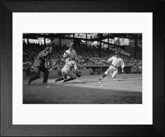 Framed Print : Senators Bucky Harris is called out trying to steal home, Aug. 13, 1925. Indians catcher Luke Sewell gets ready for the tag