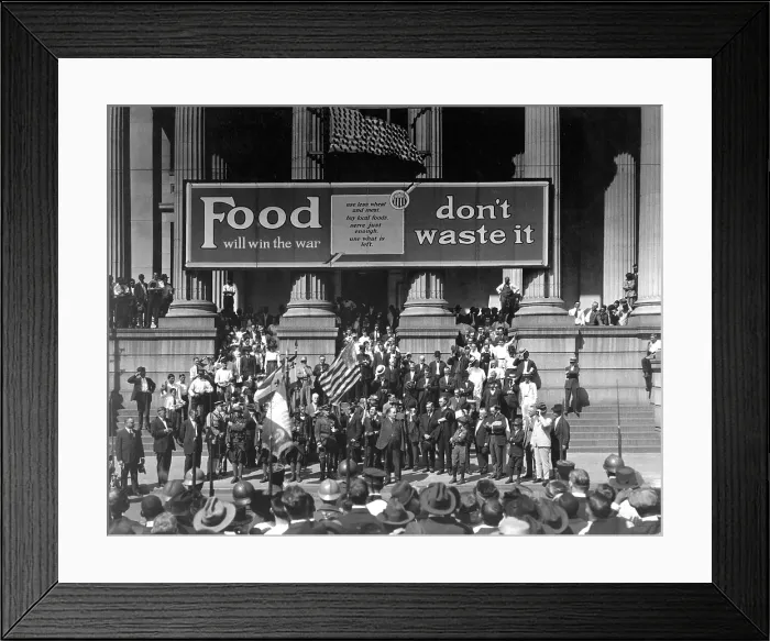 Framed Print : Food Will Win The War. Don't Waste It, exhorts the banner at a rally for the Fourth Liberty Loan Campaign during World War I. New Orleans, October 2, 1918