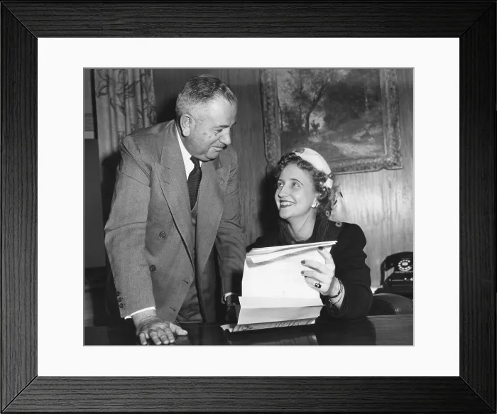 Framed Print : Margaret Truman signs a contract to make a recording. Feb. 1. 1950. With her is Frank M. Folsom, President of Radio Corporation of America. - (BSLOC_2014_15_99)