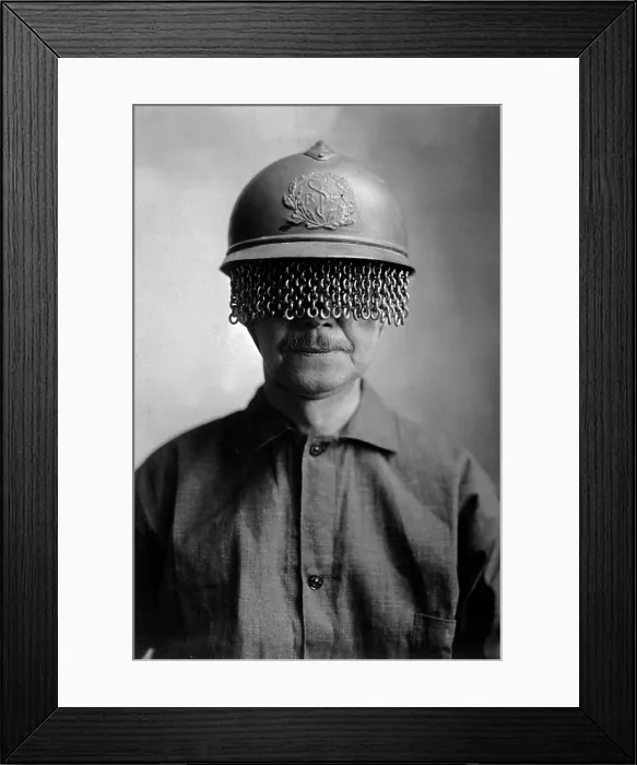 Framed Print : Chain screens on steel helmet to protect World War I soldiers eyes from fragments of shell, rock, etc. It was manufactured by E. J. Codd Co. Baltimore, Md. Ca. 1918