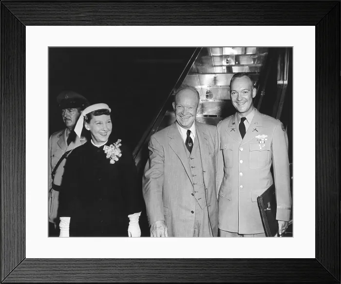 Framed Print : President Eisenhower's family departs for the Geneva Summit Conference. L-R: First Lady, the President, and their son, Major John Eisenhower