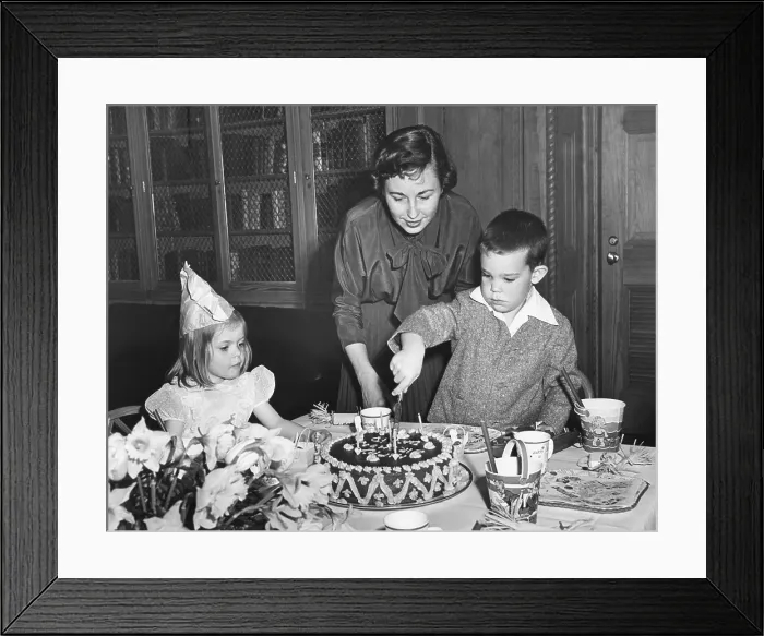 Framed Print : David Eisenhower, the President's 5 year old grandson, cutting his birthday cake. March 30, 1953. L-R: Sister Barbara Anne, mother Barbara Eisenhower, and sister Barbara Ann Framed Print : David Eisenhower, the President's 5 year old grandson, cutting his birthday cake. March 30, 1953. L-R: Sister Barbara Anne, mother Barbara Eisenhower, and sister Barbara Ann