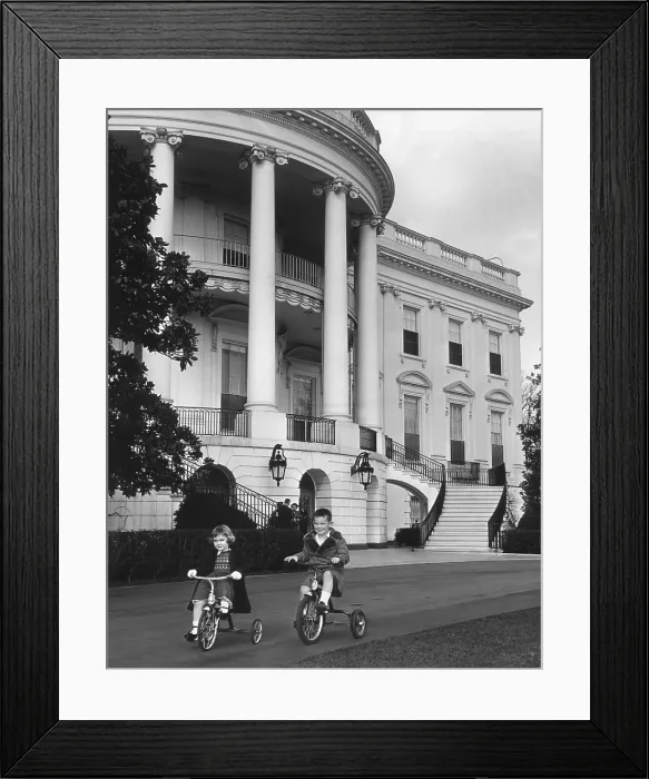 Framed Print : President Eisenhower's grandchildren, Susan and Barbara Ann, riding tricycles at the White House. March 13, 1953. - (BSLOC_2014_16_107)