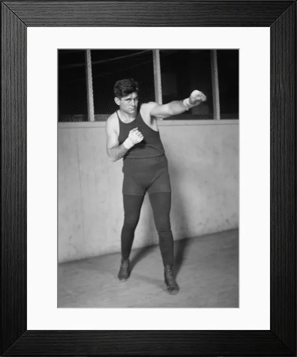 Framed Print : Argentinian Boxer Luis Angel Firpo knocked Jack Dempsey out of the ring on Sept. 14, 1923. Dempsey climbed back in and KO'd Firpo in 5 minutes