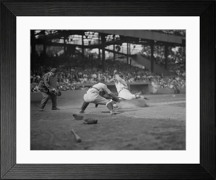 Framed Print : Washington Senators Goose Goslin slides safely into home, August 15, 1925. New York Yankees catcher Wally Schan reaches for the baseball which came too late for the out