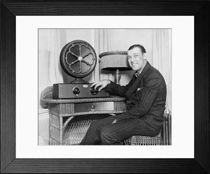 Framed Print : Boxer Jack Sharkey at a radio with external speaker, ca. 1925-28. (BSLOC_2015_17_81) Framed Print : Boxer Jack Sharkey at a radio with external speaker, ca. 1925-28. (BSLOC_2015_17_81)