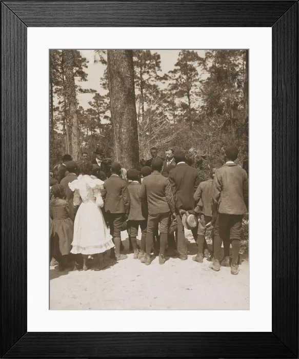 Framed Print : Theodore Roosevelt listening to African American child singing, April 10, 1902. They were child laborers on the Pinehurst Tea Farm, Summerville, South Carolina (BSLOC_2017_6_55)