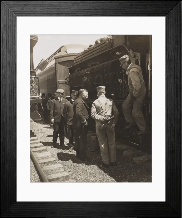 Framed Print : President Theodore Roosevelt talking with railroad workers, April-June 1906. Standing beside the coal car, the group includes locomotive operators and conductors