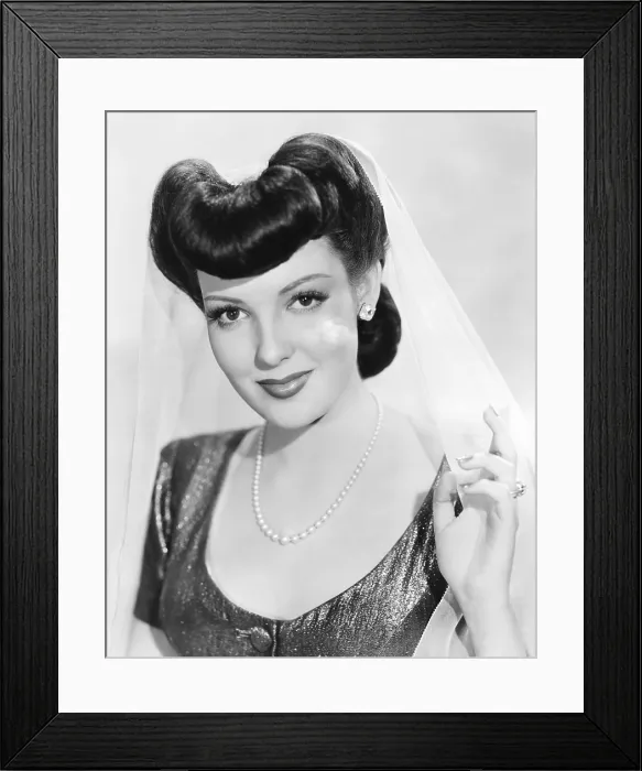Framed Print : SWEET AND LOW-DOWN, Linda Darnell, 1944, TM & Copyright 20th Century Fox Film Corp. / courtesy Everett Collection Framed Print : SWEET AND LOW-DOWN, Linda Darnell, 1944, TM & Copyright 20th Century Fox Film Corp. / courtesy Everett Collection