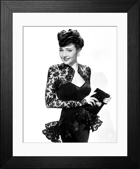 Framed Print : SWEET AND LOW-DOWN, Lynn Bari, in a black lace dress by Yvonne Wood, 1944. TM and Copyright 20th Century Fox Film Corp. All rights reserved / courtesy Everett Collection