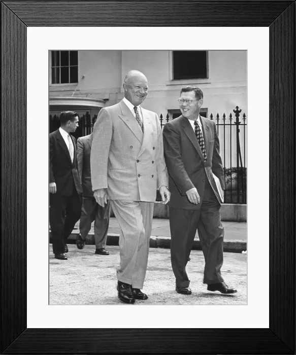 Framed Print : President Eisenhower and White House Press Secretary James Hagerty, on way to a press conference. May 19, 1954. - (BSLOC_2014_16_117)