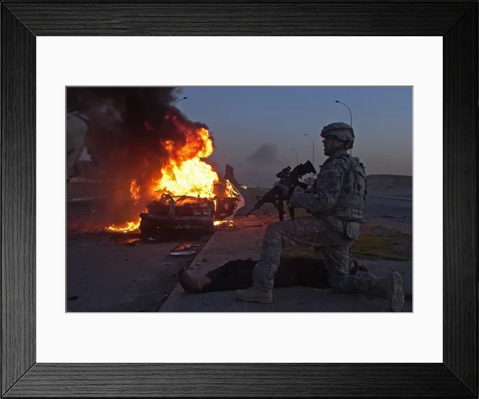 Framed Print : US Army soldier yells for a medic to treat an Iraqi civilian injured in a car bomb explosion in Mosul Iraq. March 6 2008. (BSLOC_2011_12_166)