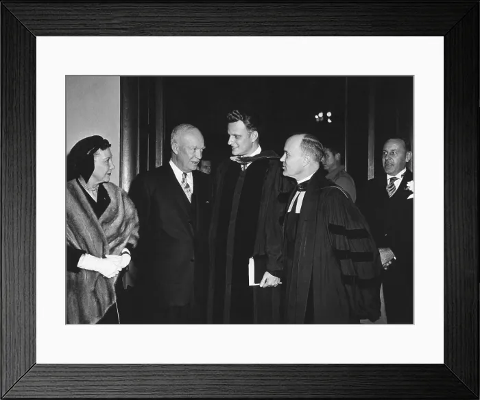 Framed Print : President and Mamie Eisenhower leaving National Presbyterian Church, March 6, 1955. Eisenhower speaks with Evangelist Billy Graham. L-R: First Lady, the President, Rev