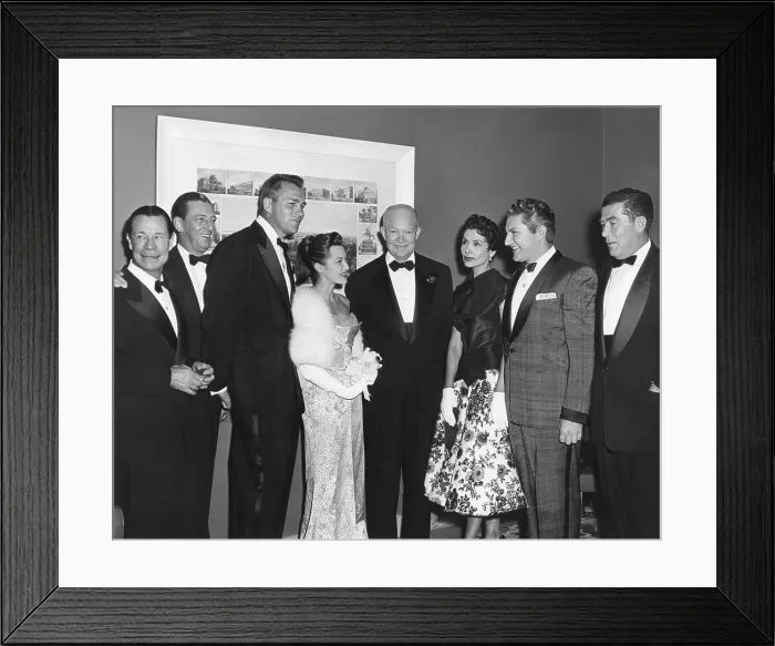 Framed Print : President Eisenhower with celebrities at the White House Photographers Dinner at the Statler Hotel. March 19, 1955. L-R: Joe E