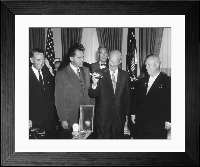 Framed Print : President Eisenhower holding a gift from Soviet Premier Nikita Khrushchev. It was a replica of metal ball, 7.5 cm in diameter, launched to the lunar surface in Luna 2 Framed Print : President Eisenhower holding a gift from Soviet Premier Nikita Khrushchev. It was a replica of metal ball, 7.5 cm in diameter, launched to the lunar surface in Luna 2