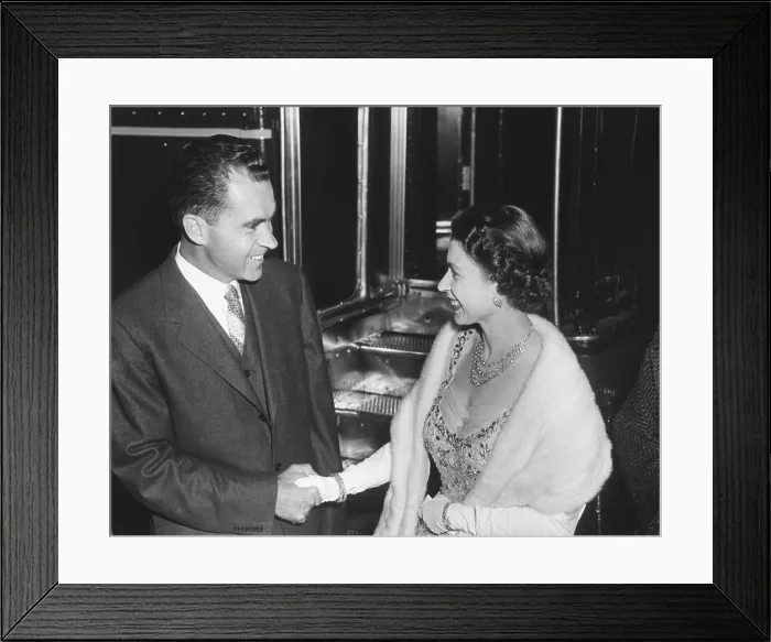 Framed Print : Queen Elizabeth II shaking Vice President Richard Nixon's hand. At the British Embassy in Washington during a dinner the royal couple gave for President and Mrs. Eisenhower
