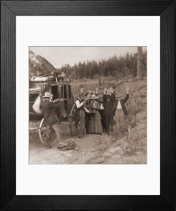 Framed Print : Reenactment of a stage coach robbery by two men, who shot a man who lies on top of the coach and are robbing the passengers. 1911 photo by Edward Tangen Framed Print : Reenactment of a stage coach robbery by two men, who shot a man who lies on top of the coach and are robbing the passengers. 1911 photo by Edward Tangen
