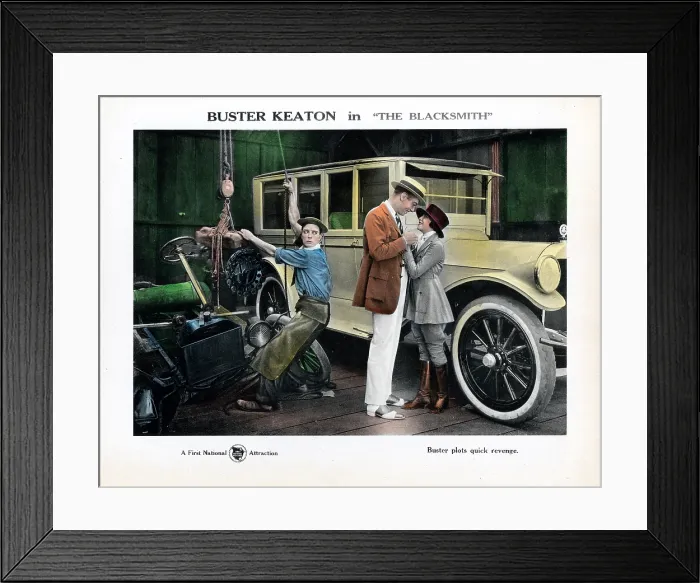 Framed Print : THE BLACKSMITH, lobbycard, Buster Keaton (left), Virginia Fox (right), 1922