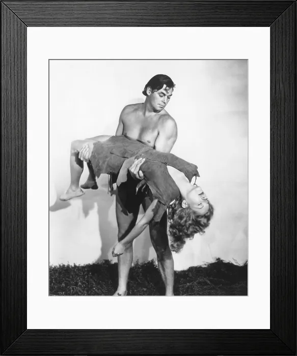 Framed Print : TARZAN AND THE AMAZONS, Johnny Weissmuller (standing), Brenda Joyce, 1945 Framed Print : TARZAN AND THE AMAZONS, Johnny Weissmuller (standing), Brenda Joyce, 1945