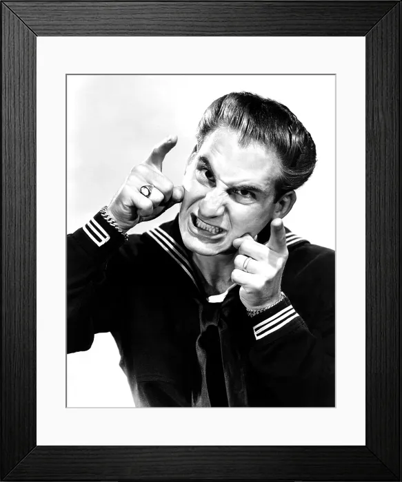 Framed Print : TARS AND SPARS, Sid Caesar (imitating a gunner aiming at an enemy plane), 1946 Framed Print : TARS AND SPARS, Sid Caesar (imitating a gunner aiming at an enemy plane), 1946