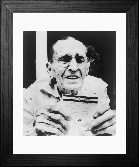 Framed Print : Centenarian Frances Perry holds Medicare card on the first day of the program's operation. Dallas, Texas. July 1, 1966. (BSLOC_2015_14_36) Framed Print : Centenarian Frances Perry holds Medicare card on the first day of the program's operation. Dallas, Texas. July 1, 1966. (BSLOC_2015_14_36)