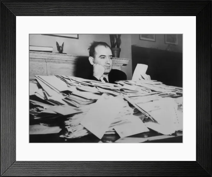 Framed Print : Sen. Joseph R. McCarthy sits at desk piled high with mail, March 24, 1950. He received over 5000 letters a day