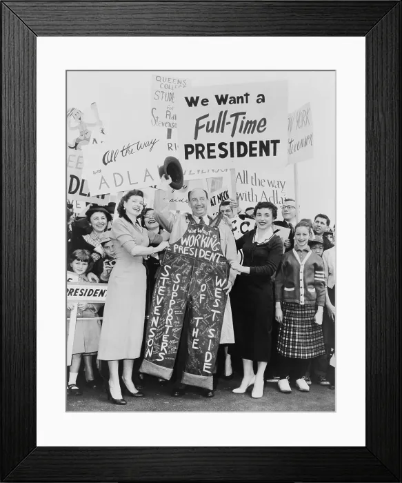 Framed Print : Adlai E. Stevenson was presented with signature-decorated blue denim overalls from supporters Framed Print : Adlai E. Stevenson was presented with signature-decorated blue denim overalls from supporters