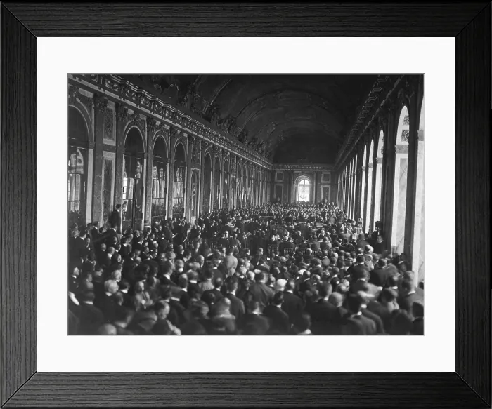 Framed Print : International delegates in the Palace des Glaces (Hall of Mirrors) during the signing of the Peace Terms ending World War I. Versailles, France. June 28, 1919
