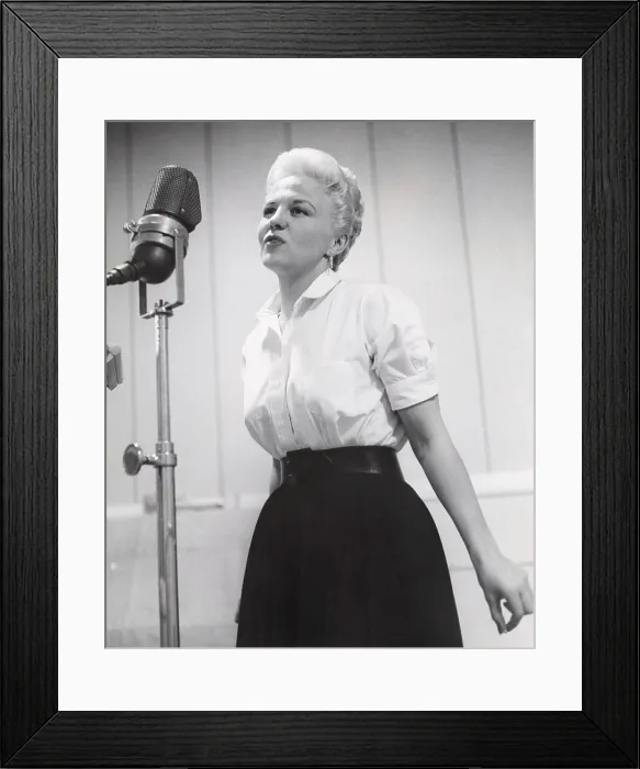 Framed Print : PETE KELLY'S BLUES, Peggy Lee, recording the song Singing a Rainbow for the film soundtrack, 1955. ph: Floyd McCarty / TV Guide / courtesy Everett Collection Framed Print : PETE KELLY'S BLUES, Peggy Lee, recording the song Singing a Rainbow for the film soundtrack, 1955. ph: Floyd McCarty / TV Guide / courtesy Everett Collection