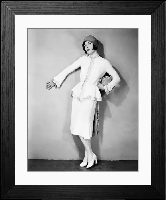 Framed Print : THE TAXI DANCER, Joan Crawford, in a white jersey sports frock trimmed with braid, by Andre-ani, 1927