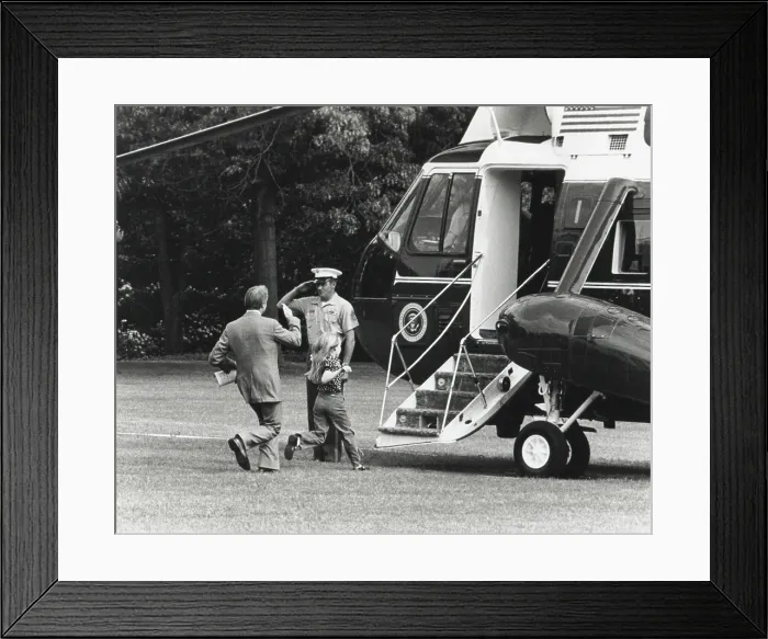 Framed Print : President Jimmy Carter and 8 year old daughter Amy running to Marine One. May 13, 1977. (BSLOC_2015_14_71) Framed Print : President Jimmy Carter and 8 year old daughter Amy running to Marine One. May 13, 1977. (BSLOC_2015_14_71)