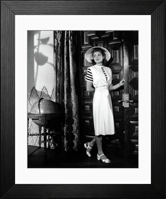Framed Print : CASABLANCA, Ingrid Bergman wearing a jumper dress designed by Orry-Kelly, 1942 Framed Print : CASABLANCA, Ingrid Bergman wearing a jumper dress designed by Orry-Kelly, 1942