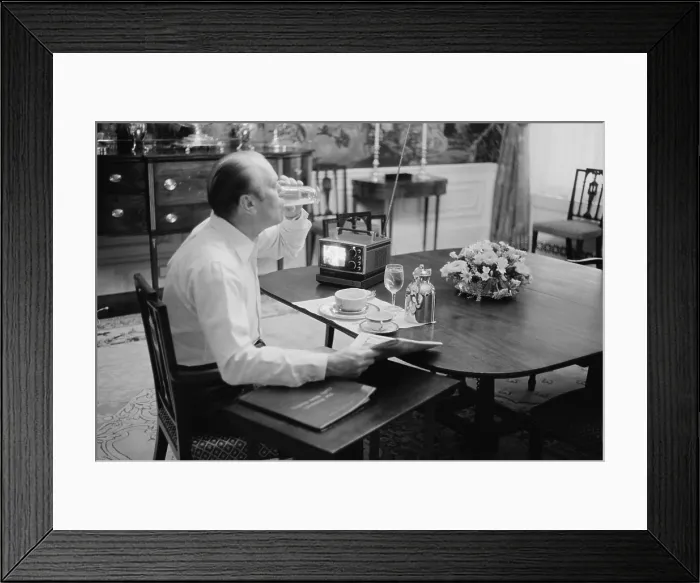 Framed Print : President Gerald Ford eating breakfast at the White House, Feb. 6, 1975. His 4 x 5 inch portable TV was the latest thing. (BSLOC_2015_14_55) Framed Print : President Gerald Ford eating breakfast at the White House, Feb. 6, 1975. His 4 x 5 inch portable TV was the latest thing. (BSLOC_2015_14_55)