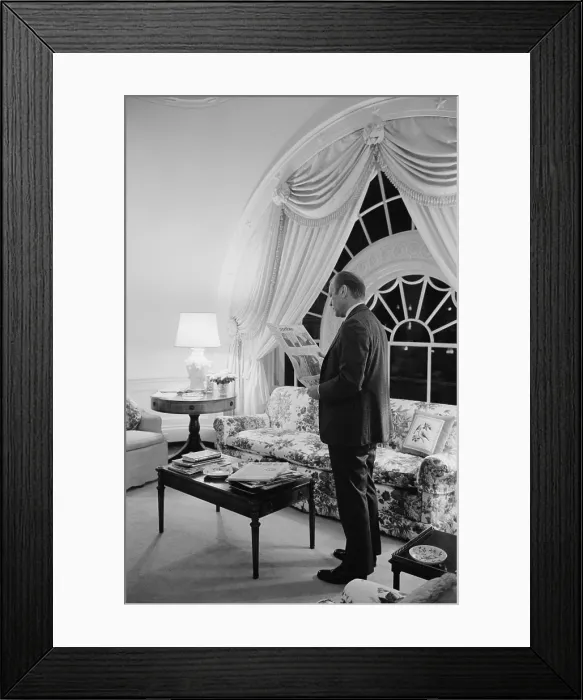 Framed Print : President Gerald Ford reading the newspaper in the living quarters of the White House, Feb. 6, 1975. (BSLOC_2015_14_56) Framed Print : President Gerald Ford reading the newspaper in the living quarters of the White House, Feb. 6, 1975. (BSLOC_2015_14_56)