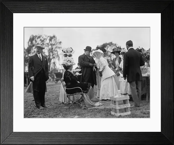 Framed Print : President William Howard Taft standing to greet guest at a White House garden party, c. 1911. Seated near the President is First Lady Helen Taft Framed Print : President William Howard Taft standing to greet guest at a White House garden party, c. 1911. Seated near the President is First Lady Helen Taft