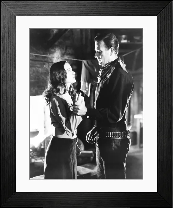Framed Print : TALL IN THE SADDLE, from left: Ella Raines, John Wayne, 1944 Framed Print : TALL IN THE SADDLE, from left: Ella Raines, John Wayne, 1944