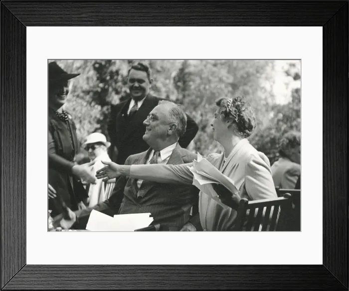 Framed Print : Franklin and Eleanor Roosevelt at a high school dedication. Hyde Park. Oct. 5, 1940. The First Lady reaches for the hand of Mrs