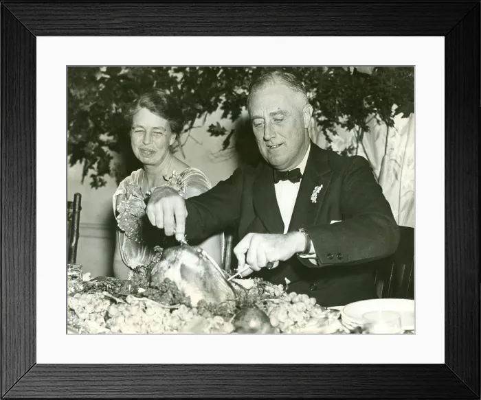 Framed Print : Franklin and Eleanor Roosevelt celebrate Thanksgiving at Warm Springs, Georgia. 1935. President FDR carves the turkey. (BSLOC_2013_5_193)