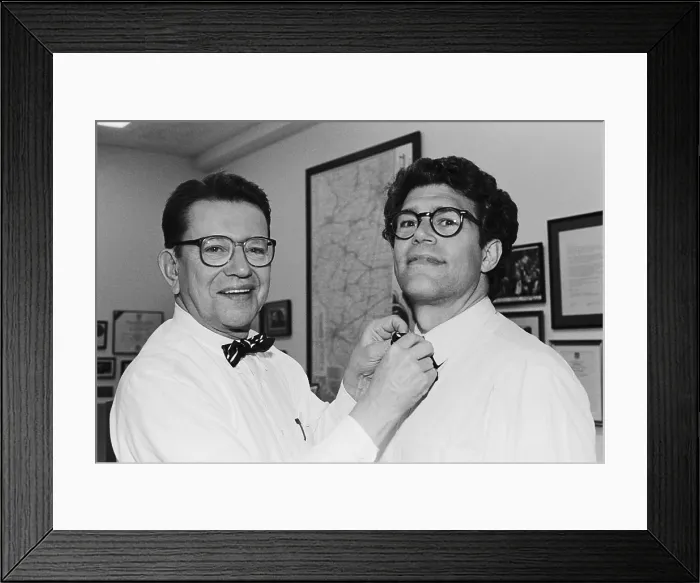 Framed Print : Senator Paul Simon straightens comedian and future Senator, Al Franken's bow tie. June 5, 1991