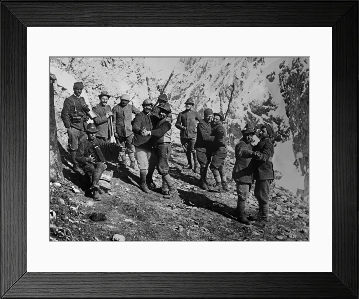 Framed Print : World War 1 in the Italian and Austria Alps. Italian soldiers at mountain outpost dance in pairs, accompanied by an accordion. Ca. 1915-17. (BSLOC_2013_1_26) Framed Print : World War 1 in the Italian and Austria Alps. Italian soldiers at mountain outpost dance in pairs, accompanied by an accordion. Ca. 1915-17. (BSLOC_2013_1_26)