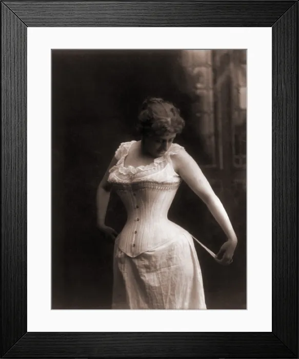 Framed Print : Women in a whale-boned corset, 1899