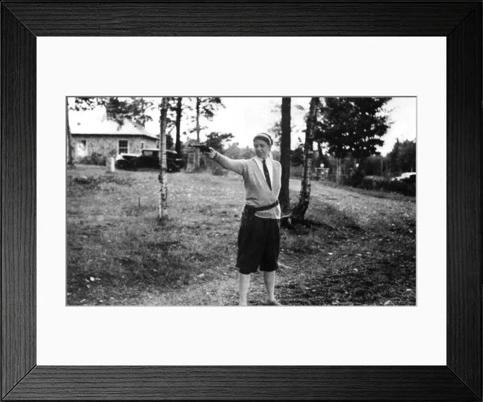 Framed Print : Eleanor Roosevelt at Chazy Lake, New York, firing hand gun. 1934. She was taught to shoot by her former body guard, Earl Miller. (BSLOC_2013_5_209)